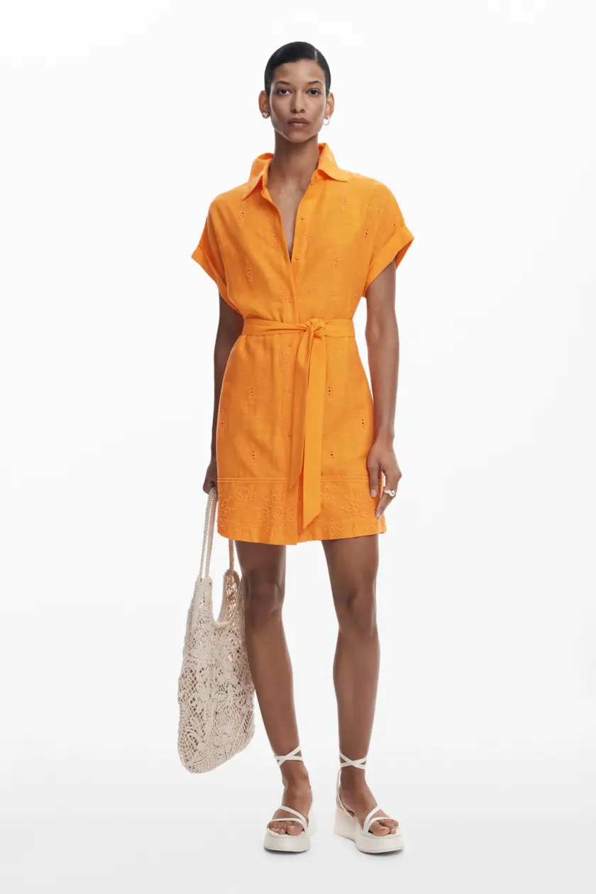 Shirt dress with perforated hem