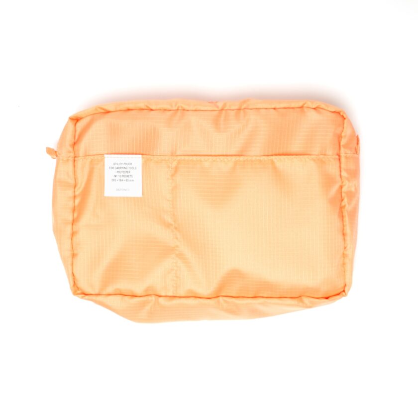 medium-sized carrying case in peach